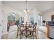 Cozy dining area with breakfast table and slider door to outside area at 286 Bonnie Bridge Circle, Myrtle Beach, SC 29579