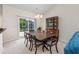 Dining room with slider door access to outside and hutch for storage at 286 Bonnie Bridge Circle, Myrtle Beach, SC 29579