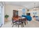 Open dining room area with slider door, hutch, and ceiling fan at 286 Bonnie Bridge Circle, Myrtle Beach, SC 29579