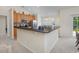 Well-equipped kitchen featuring modern appliances, ample counter space, and a convenient breakfast bar at 286 Bonnie Bridge Circle, Myrtle Beach, SC 29579