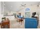 Bright and airy living room featuring vaulted ceilings, lots of natural light, and comfortable seating at 286 Bonnie Bridge Circle, Myrtle Beach, SC 29579