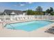 A community swimming pool surrounded by lounge chairs, with a fenced in perimeter at 286 Bonnie Bridge Circle, Myrtle Beach, SC 29579