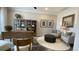 Well-appointed home office featuring a desk, built-in shelving, comfortable seating, and stylish accents at 293 Eagle Claw Dr., Calabash, NC 28467