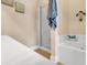 Bright bathroom with a large bathtub and a separate glass-door shower stall at 307 River Rock Ln. # 906, Murrells Inlet, SC 29576