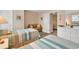 Comfortable bedroom featuring twin beds and a seating area at 307 River Rock Ln. # 906, Murrells Inlet, SC 29576