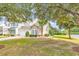 Charming two-story home featuring a well-manicured lawn, attached garage, and tasteful landscaping at 307 River Rock Ln. # 906, Murrells Inlet, SC 29576