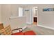 Bright hallway leads to the bathroom, enhanced by a coastal-themed decor at 307 River Rock Ln. # 906, Murrells Inlet, SC 29576