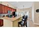 Well-equipped kitchen with stainless steel appliances and a breakfast bar with seating at 307 River Rock Ln. # 906, Murrells Inlet, SC 29576