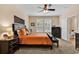 Comfortable main bedroom with side tables, carpet flooring, and a full bathroom at 307 River Rock Ln. # 906, Murrells Inlet, SC 29576