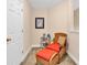 Cozy reading nook featuring a comfortable wicker chair and coastal decor at 307 River Rock Ln. # 906, Murrells Inlet, SC 29576