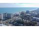 Coastal aerial view showcasing the oceanfront location, nearby buildings, and beautiful sandy beach at 312 73Rd Ave. N # 15, Myrtle Beach, SC 29572