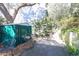 Secluded backyard with a storage shed, mature trees, and cozy seating, offering a peaceful outdoor retreat at 312 73Rd Ave. N # 15, Myrtle Beach, SC 29572