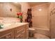 Modest bathroom showcasing a floral motif, vanity, and bathtub with shower at 312 73Rd Ave. N # 15, Myrtle Beach, SC 29572