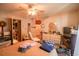 Bedroom with a comfortable bed, fan, and a vintage furniture at 312 73Rd Ave. N # 15, Myrtle Beach, SC 29572