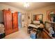 Bedroom featuring neutral carpet, wooden furnishings, and a vintage aesthetic at 312 73Rd Ave. N # 15, Myrtle Beach, SC 29572