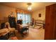 Bedroom featuring neutral carpet, black furnishings, and a sliding glass door at 312 73Rd Ave. N # 15, Myrtle Beach, SC 29572