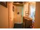 Cozy entryway featuring a front door, unique decor, and vintage storage, creating a warm and inviting welcome at 312 73Rd Ave. N # 15, Myrtle Beach, SC 29572