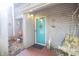 Charming condo featuring a vibrant turquoise front door and decorative exterior accents at 312 73Rd Ave. N # 15, Myrtle Beach, SC 29572