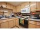 Vintage kitchen with classic appliances and ample storage space at 312 73Rd Ave. N # 15, Myrtle Beach, SC 29572