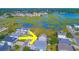 An aerial shot shows the house located near marshes and waterways, with surrounding houses and roads at 406 26Th Ave N, North Myrtle Beach, SC 29582