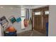 Finished basement with beach-themed decor, including beach chairs and an umbrella, for a relaxed, coastal atmosphere at 406 26Th Ave N, North Myrtle Beach, SC 29582