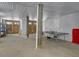 Spacious basement area perfect for recreation, featuring a ping pong table and ample space for entertainment and storage at 406 26Th Ave N, North Myrtle Beach, SC 29582