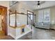 Spacious interior view showcasing staircase, living area, and natural light from large windows at 406 26Th Ave N, North Myrtle Beach, SC 29582