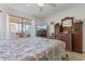 The bright main bedroom features ample natural light, and traditional furnishings at 4350 Intercoastal Dr. # 2207, Little River, SC 29566