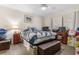 Bedroom with a bed, wooden dresser, computer, and ceiling fan at 4350 Intercoastal Dr. # 2207, Little River, SC 29566