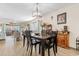 This dining room features a stylish table and chairs set, perfect for gatherings at 4350 Intercoastal Dr. # 2207, Little River, SC 29566