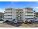 Exterior view of building with parking lot at 4350 Intercoastal Dr. # 2207, Little River, SC 29566