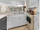 Bright kitchen features white cabinetry, modern appliances, and an open layout at 4350 Intercoastal Dr. # 2207, Little River, SC 29566