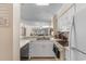 Kitchen with views into living room at 4350 Intercoastal Dr. # 2207, Little River, SC 29566