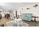 This bright living area includes comfortable seating, stylish decor, and natural light at 4350 Intercoastal Dr. # 2207, Little River, SC 29566