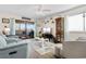 Inviting living room with comfortable seating, access to a balcony, and stylish decor at 4350 Intercoastal Dr. # 2207, Little River, SC 29566