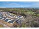 Aerial view of a coastal community near a golf course and the ocean, offering scenic residential living at 5501 Bristle Cone Ct., Myrtle Beach, SC 29577