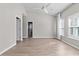 Open bedroom with plantation shutters and wood-look flooring at 5501 Bristle Cone Ct., Myrtle Beach, SC 29577