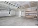 Garage featuring newly painted walls and concrete floors at 5501 Bristle Cone Ct., Myrtle Beach, SC 29577