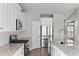 Kitchen with white cabinets, granite countertops, stainless steel appliances, and gas range at 5501 Bristle Cone Ct., Myrtle Beach, SC 29577