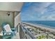 Balcony featuring a chair with unobstructed views of the beach and ocean at 5523 N Ocean Blvd. # 1513, Myrtle Beach, SC 29577