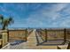 Wooden walkway providing access to the beach and ocean at 5523 N Ocean Blvd. # 1513, Myrtle Beach, SC 29577