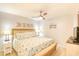 Bright bedroom featuring a king-sized bed, ceiling fan, and coastal-themed decor at 5523 N Ocean Blvd. # 1513, Myrtle Beach, SC 29577