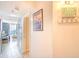 Hallway leading to a living area with ocean views and beach-themed decorations at 5523 N Ocean Blvd. # 1513, Myrtle Beach, SC 29577