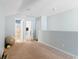 Upstairs bonus room area with neutral carpet and interior doors to bathroom and living area at 556 Cedar Lakes Dr., Little River, SC 29566