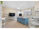 Bright office with a beach themed art, carpet floors, and custom shelving for storage at 556 Cedar Lakes Dr., Little River, SC 29566