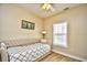 Cozy bedroom with a daybed, window, and neutral tones creating a relaxing and inviting space at 5801 Oyster Catcher Dr. # 723, North Myrtle Beach, SC 29582