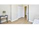Bright bedroom featuring a modern lamp and a closet with double doors at 5801 Oyster Catcher Dr. # 723, North Myrtle Beach, SC 29582