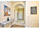 Inviting foyer with tile flooring, decor, and archway leading into the home at 5801 Oyster Catcher Dr. # 723, North Myrtle Beach, SC 29582