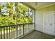 Enjoy outdoor living on this screened porch overlooking a green landscape at 5801 Oyster Catcher Dr. # 723, North Myrtle Beach, SC 29582