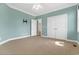 Light blue bedroom with carpet, a ceiling fan, and a closet at 598 Summer Green Ct., Sunset Beach, NC 28468